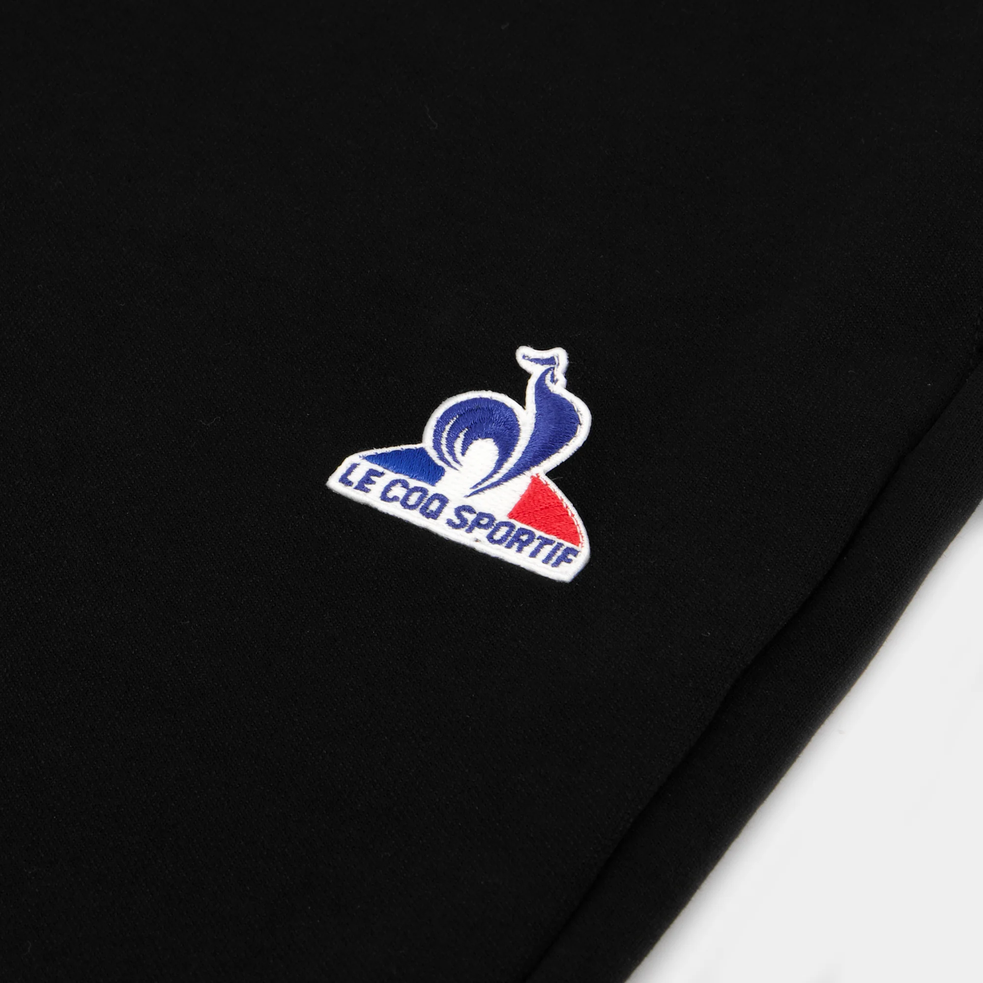 EssentielsMen's black regular-fit pants                MEN'S SIZE GUIDE