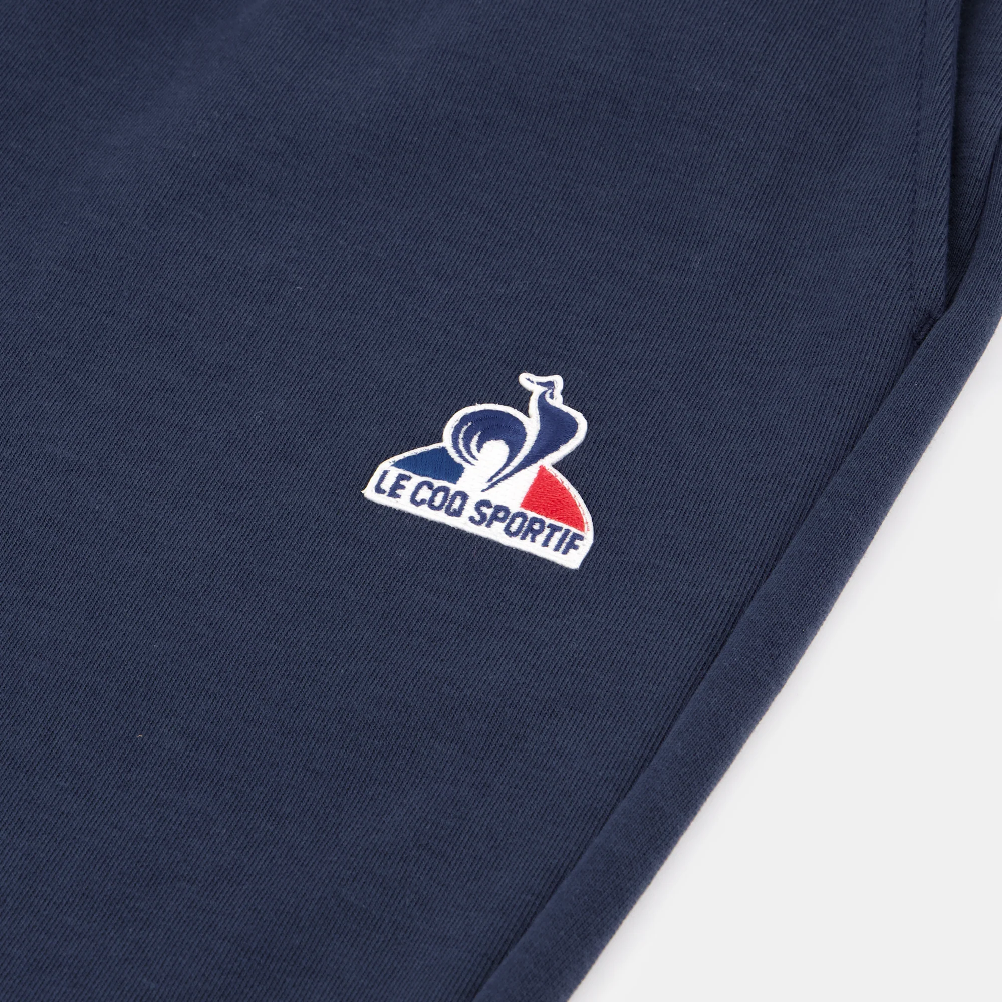 EssentielsMen's black regular-fit pants                MEN'S SIZE GUIDE