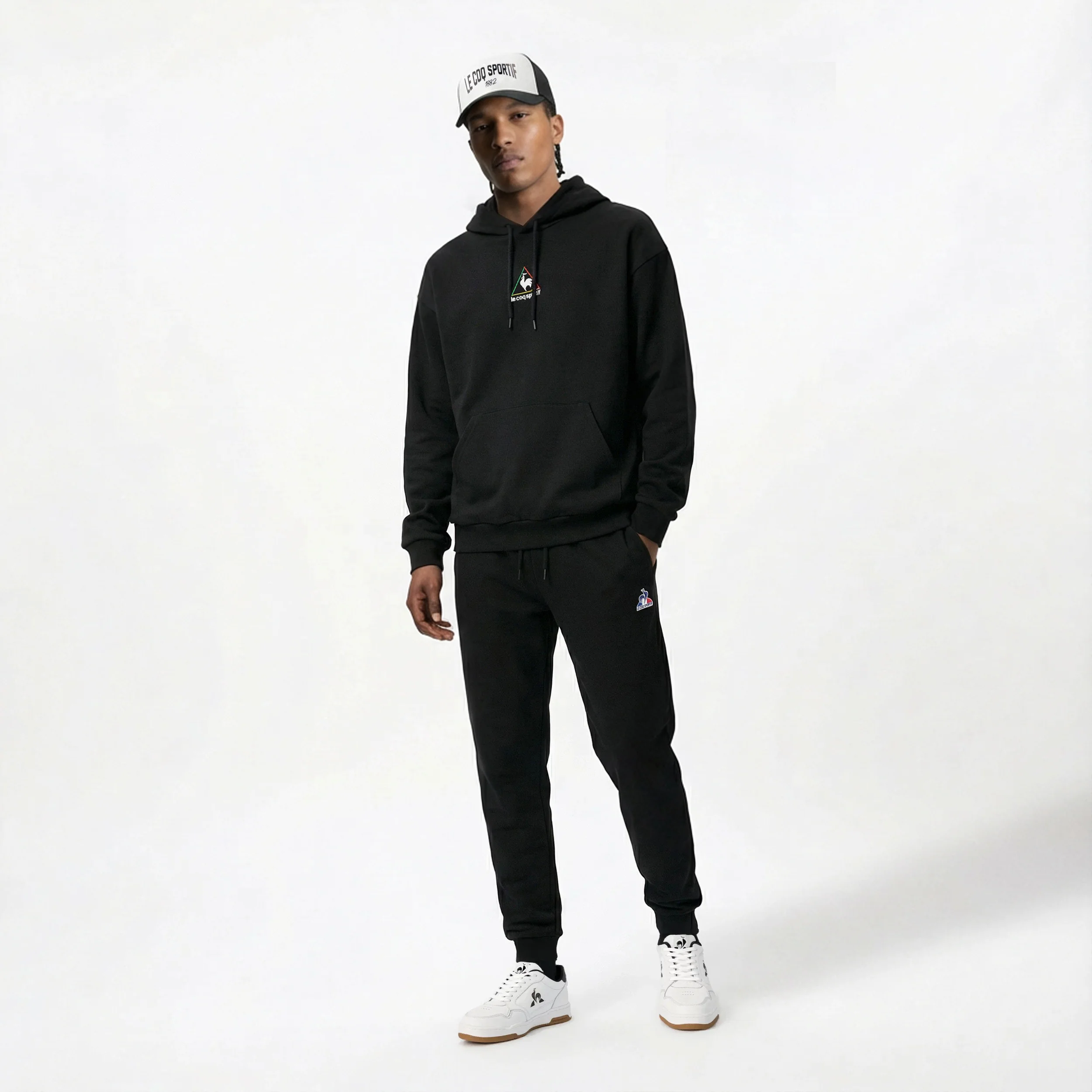 Village des Nations Men's Relaxed Fit Hoodie                MEN'S SIZE GUIDE