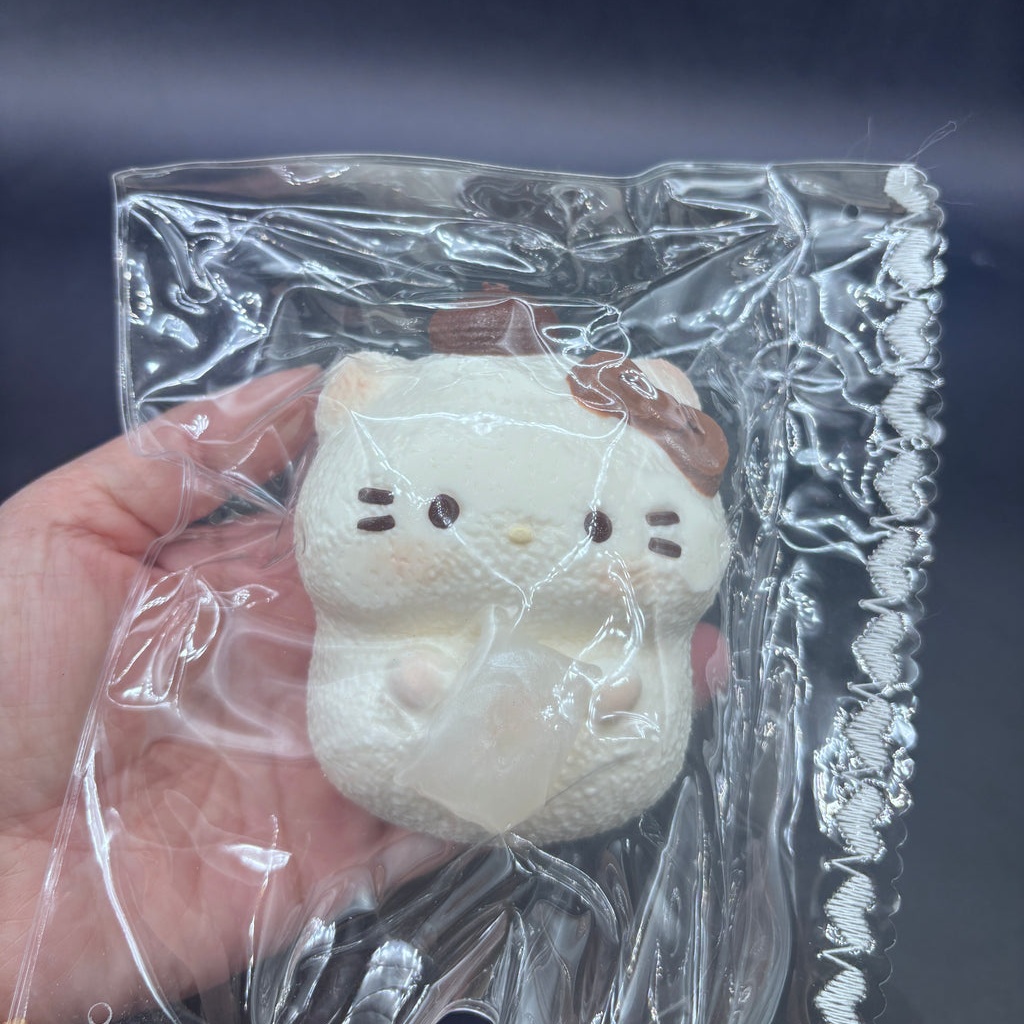 Frozen butter cute kitty holding a pillow taba squishy