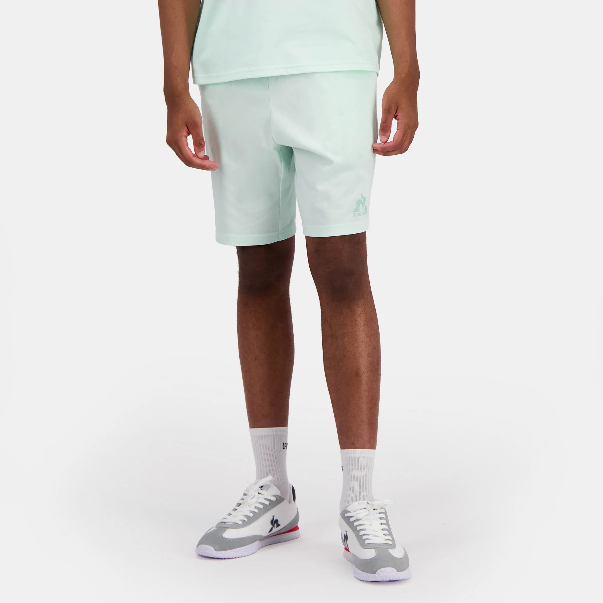 EssentielsMen's pastel green shorts                MEN'S SIZE GUIDE