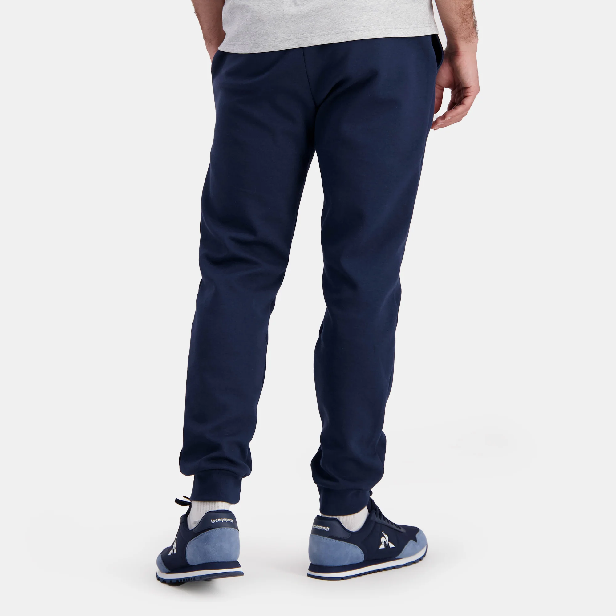 EssentielsMen's black regular-fit pants                MEN'S SIZE GUIDE