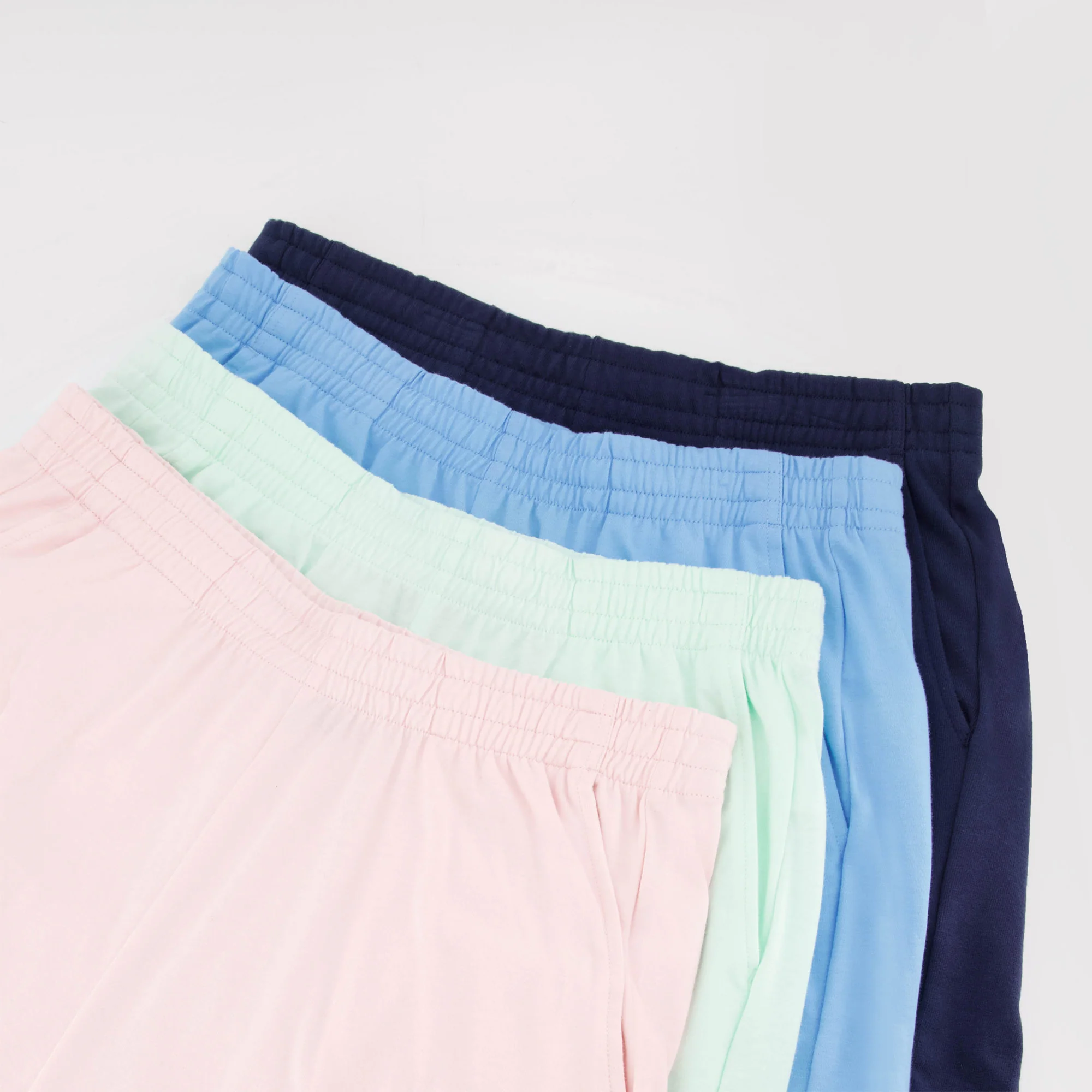 EssentielsMen's pastel green shorts                MEN'S SIZE GUIDE