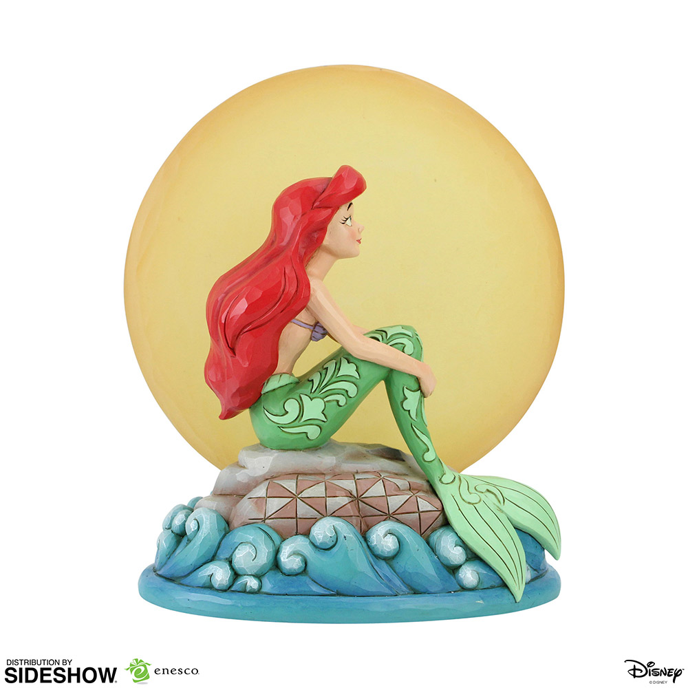Ariel Sitting on Rock by Moon