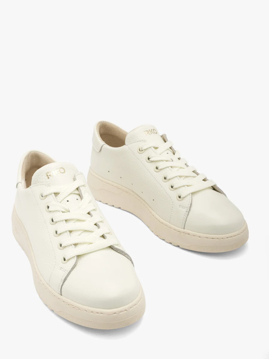 Białe półbuty sportowe na kremowym spodzie