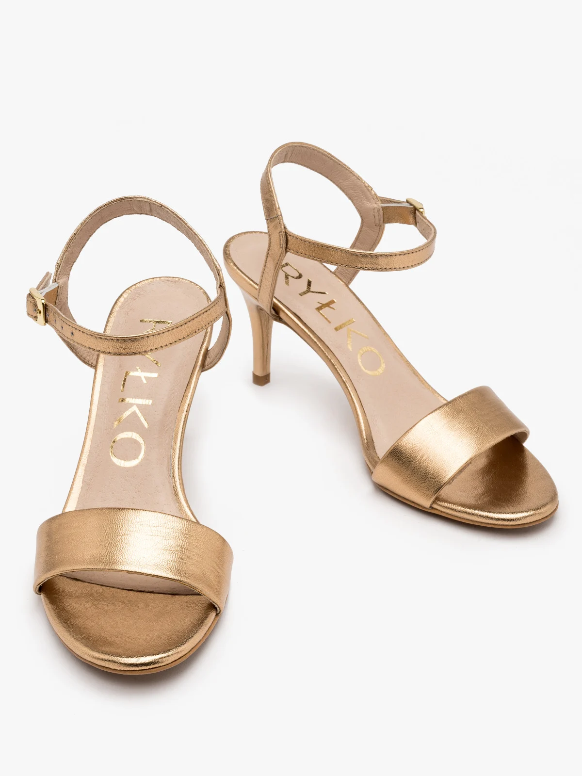 Złote sandały na szpilce