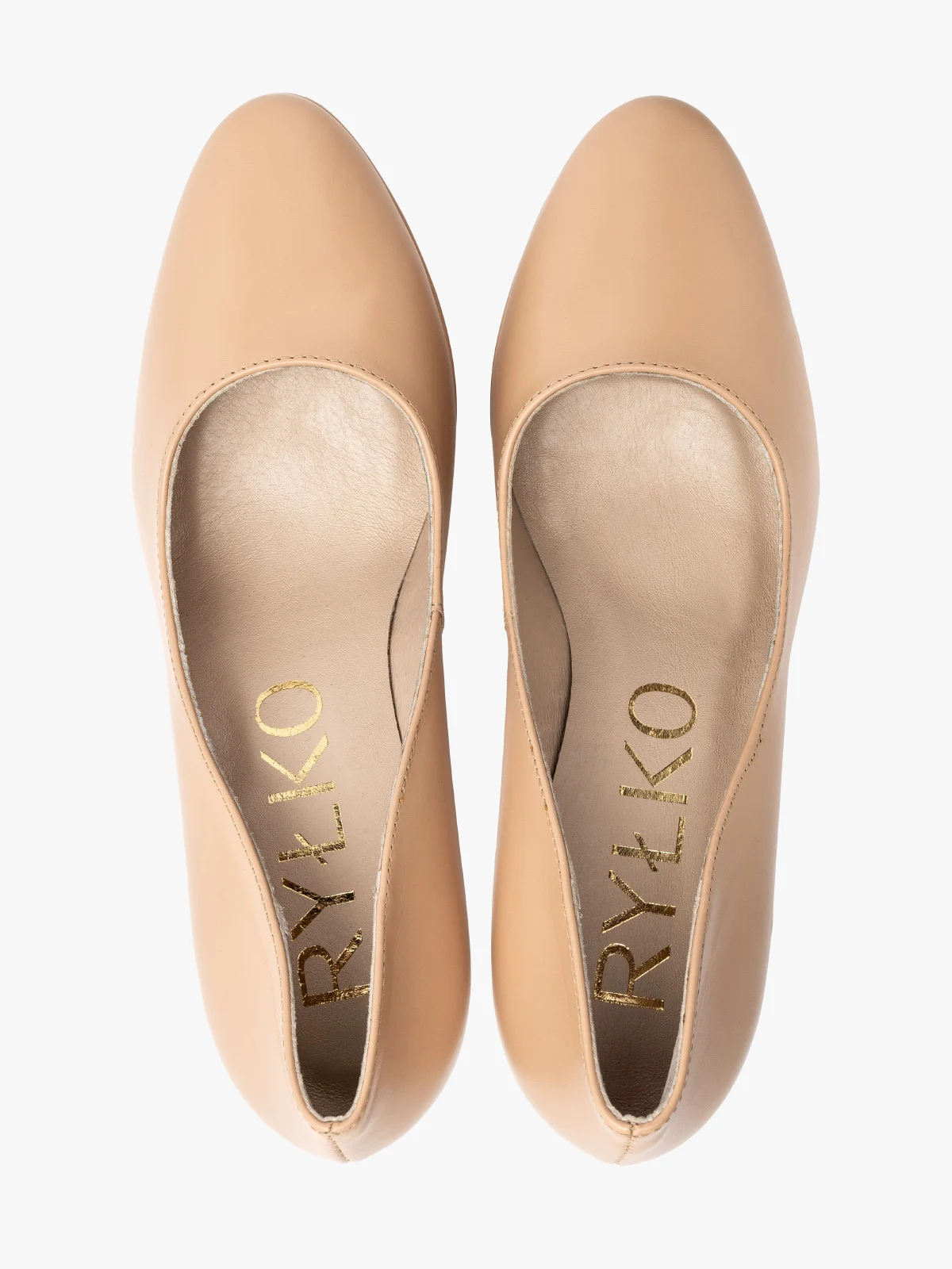 Beżowe czółenko na  wysokim obcasie oraz balu