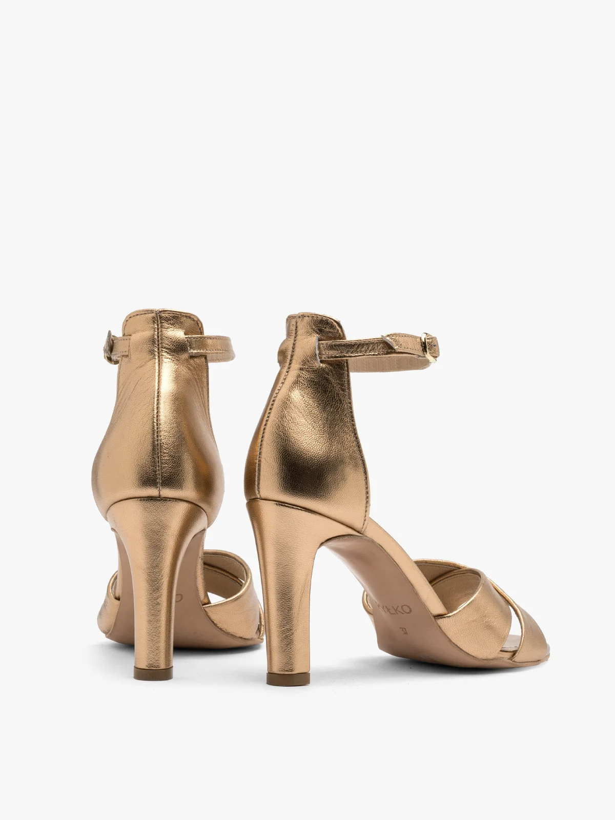 Złote sandały na obcasie