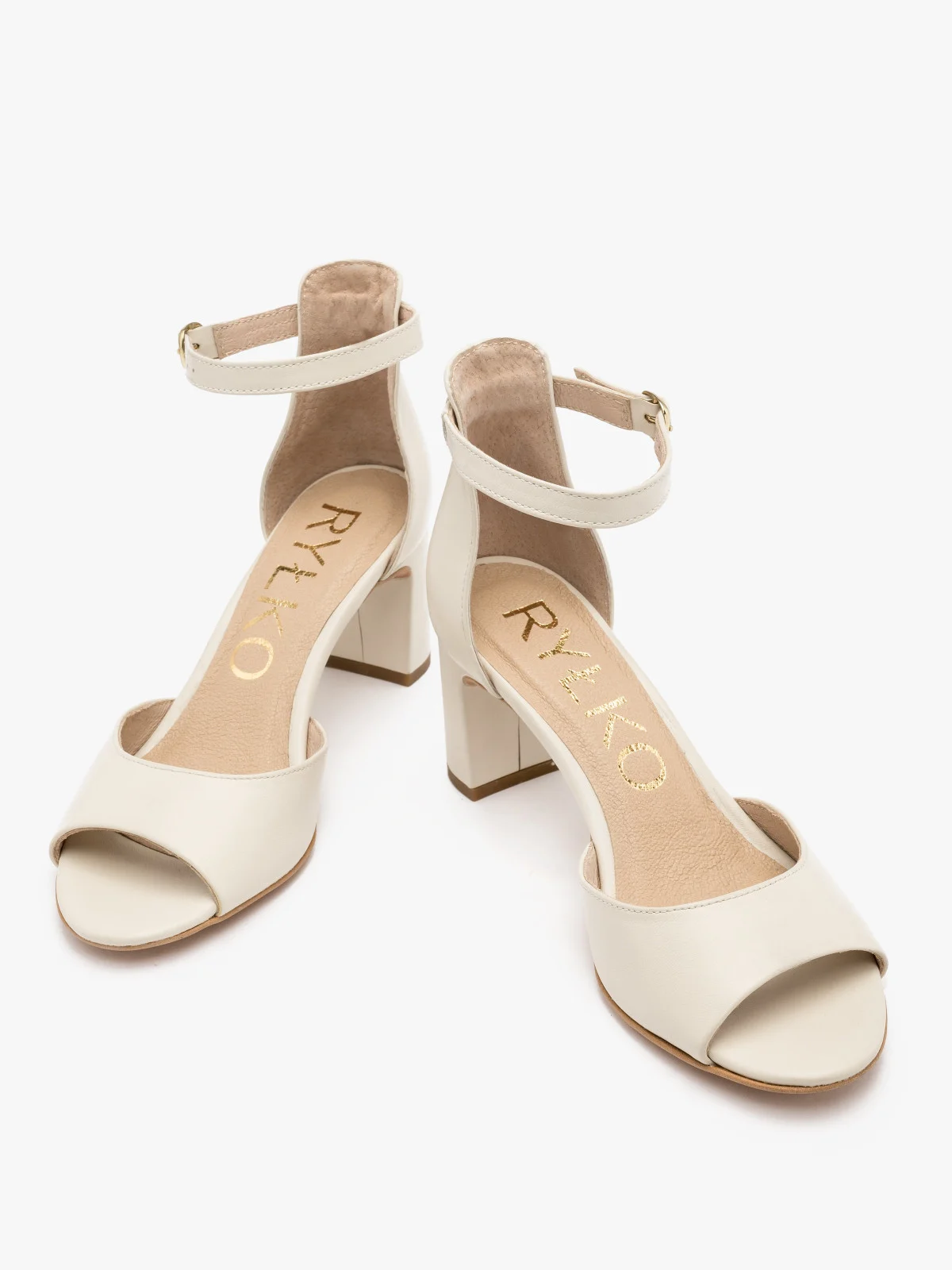 Klasyczne, kremowe sandały na obcasie