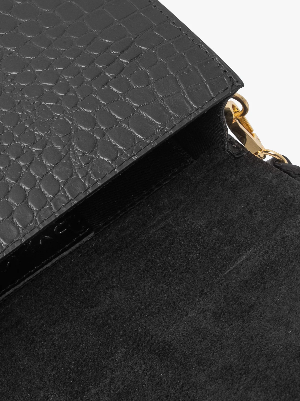 Elegancka, czarna torebka w zwierzęcy deseń