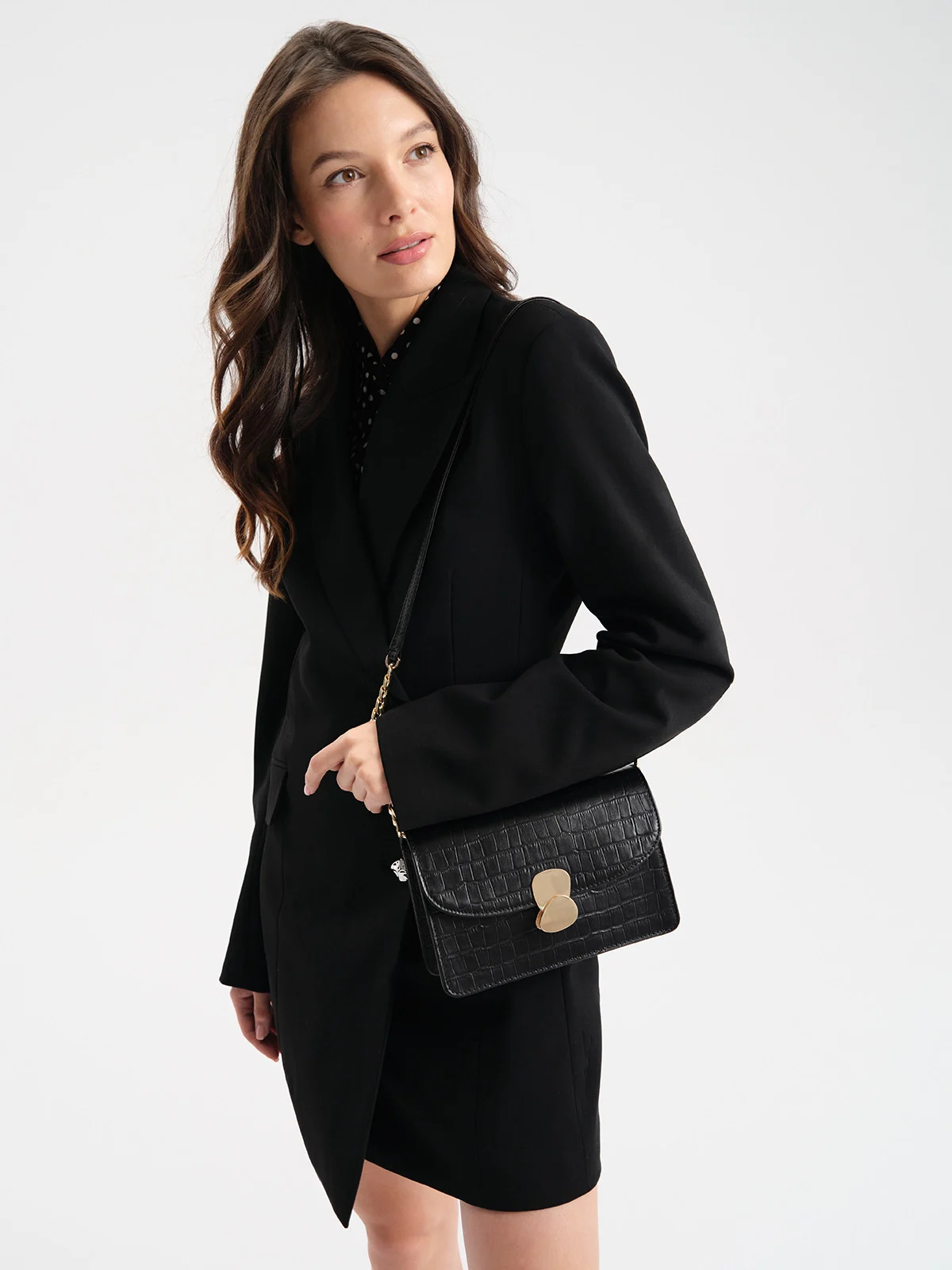 Elegancka, czarna torebka z motywem zwierzęcym