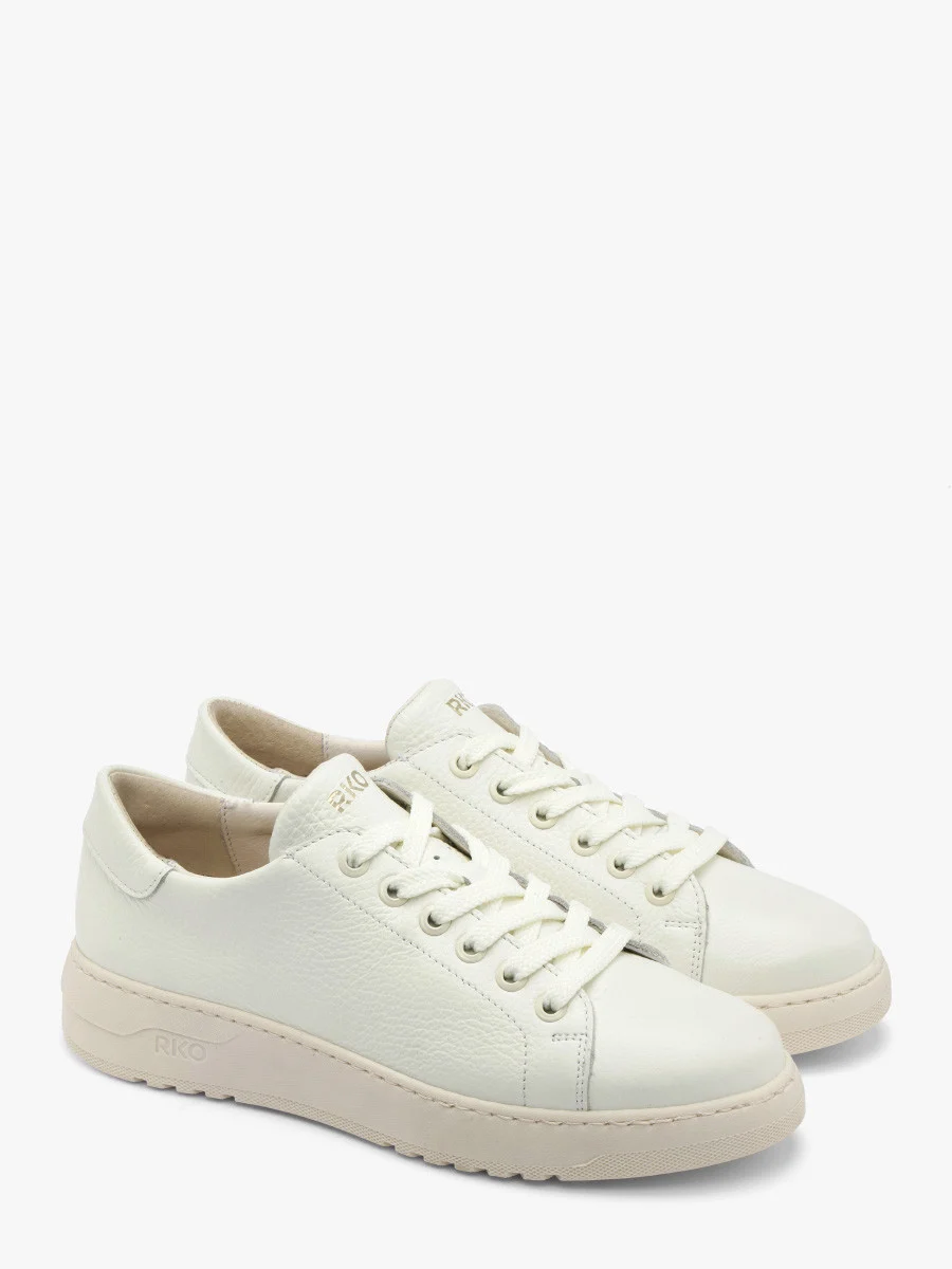 Białe półbuty sportowe na kremowym spodzie