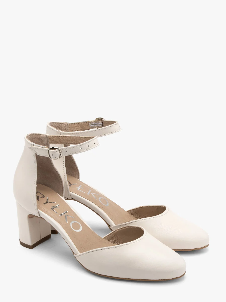 Kremowe czółenka z paskiem wokół kostki