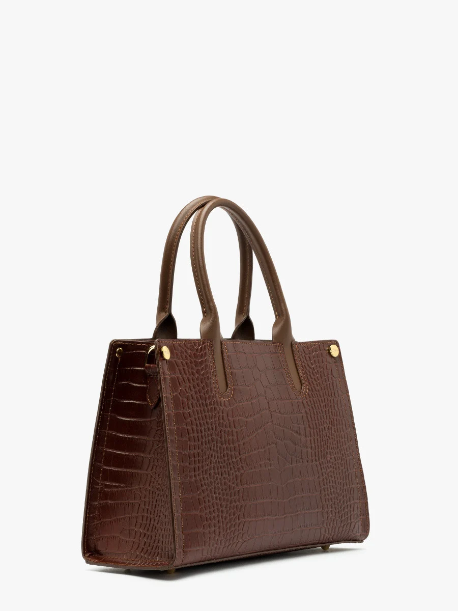 Brązowa torebka z ozdobną fakturą