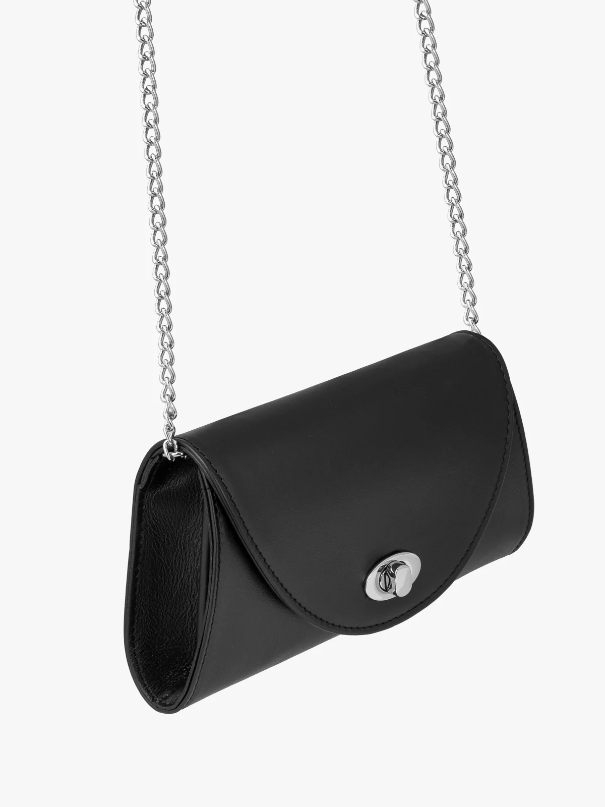 Mała elegancka torebka zapinana na ozdobną klamrę