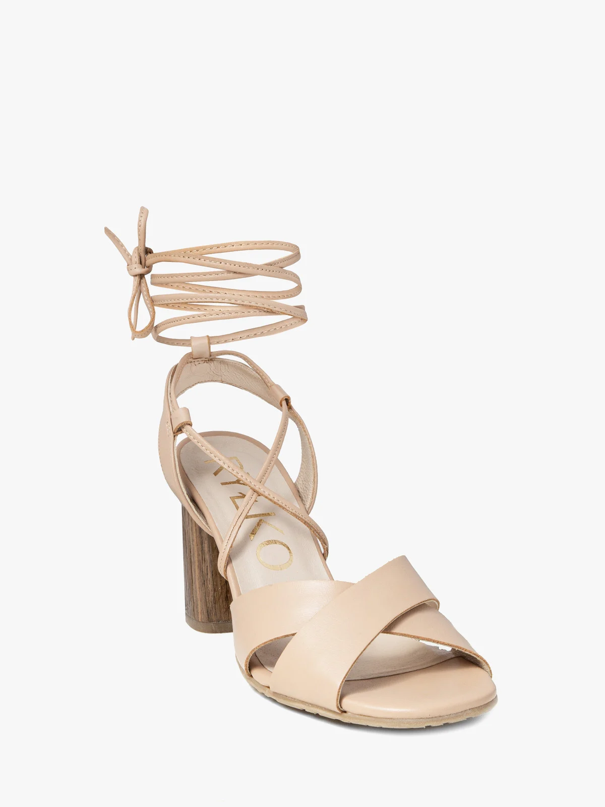 Beżowe sandały na słupku z wiązaniem wokół kostki