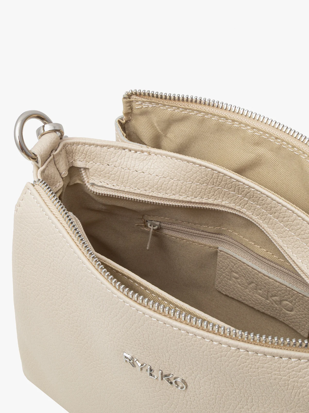 Kremowa torebka z regulowanym paskiem