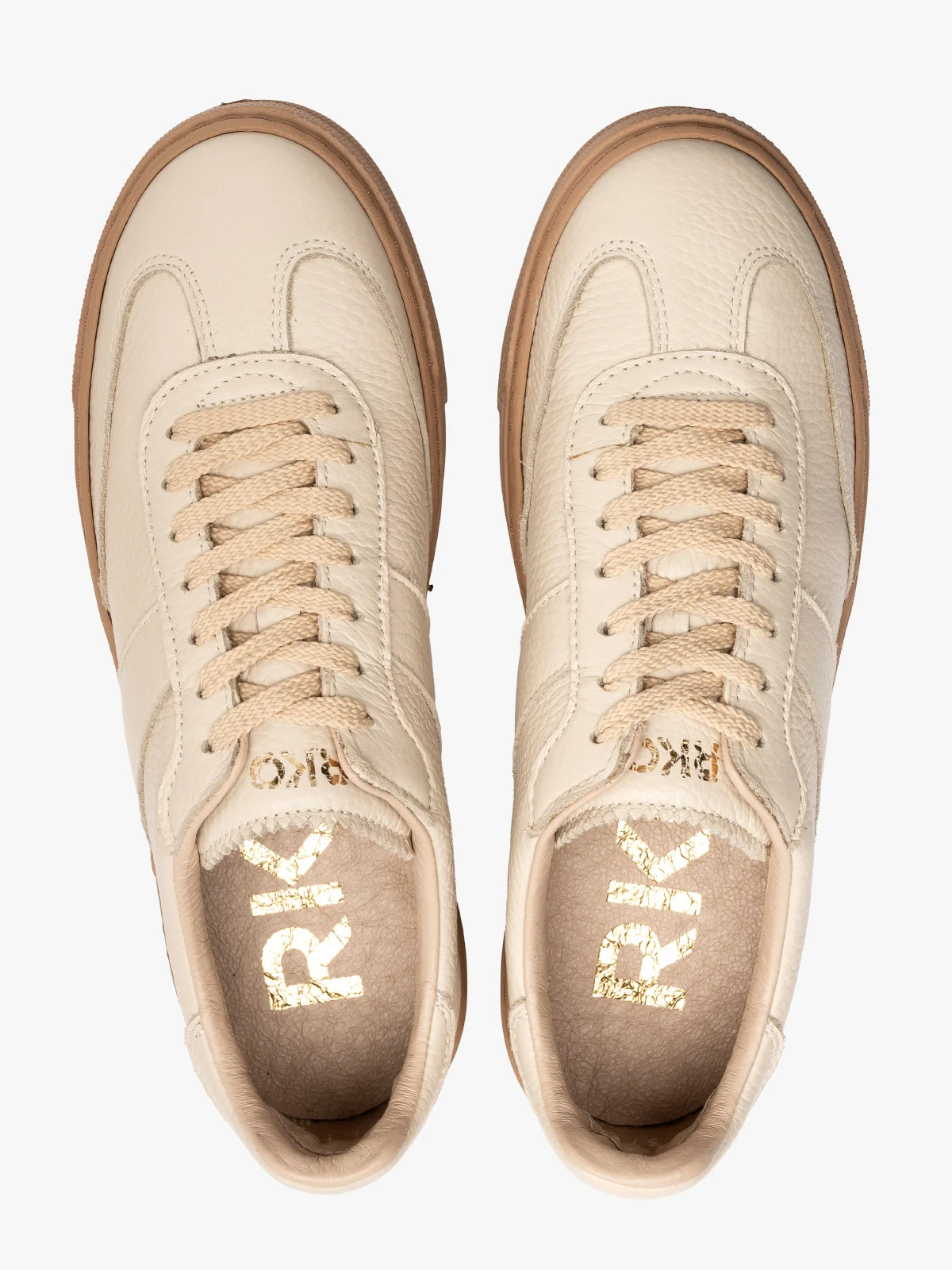 Kremowe półbuty sportowe na ciemnobeżowym spodzie