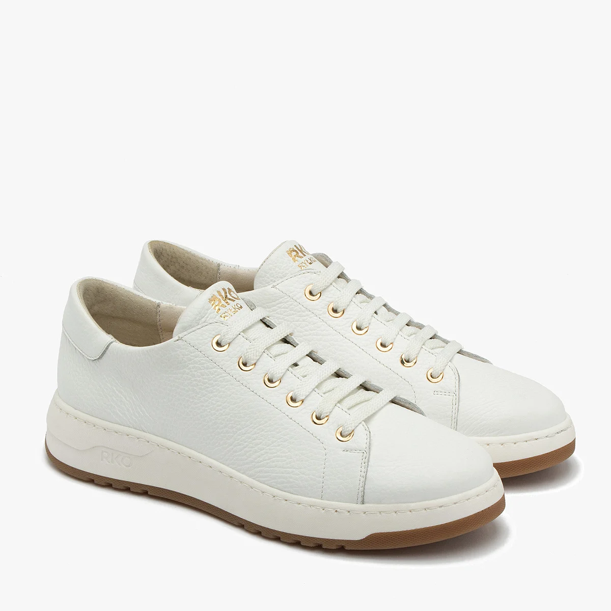 Białe półbuty sportowe ze złotymi detalami