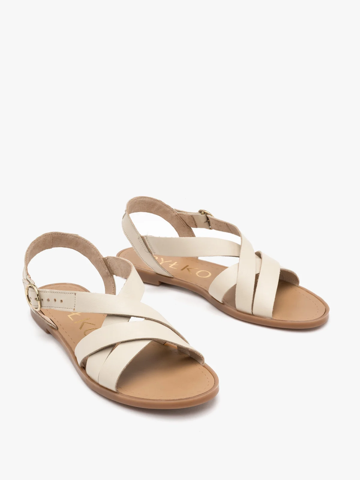 Kremowe sandały na płaskiej podeszwie
