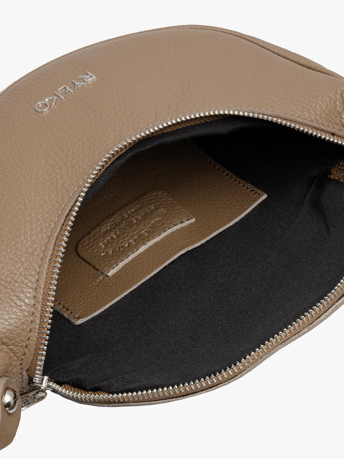 Beżowa, owalna torebka z szerokim paskiem