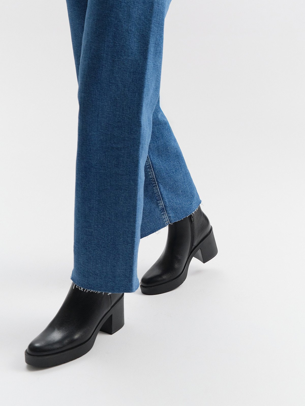 Czarne botki damskie na masywnym spodzie