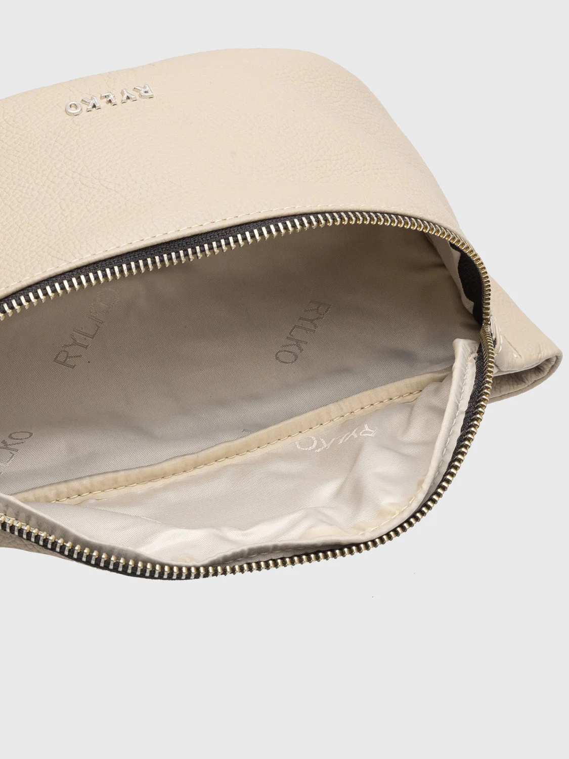 Mała beżowa torebka typu nerka