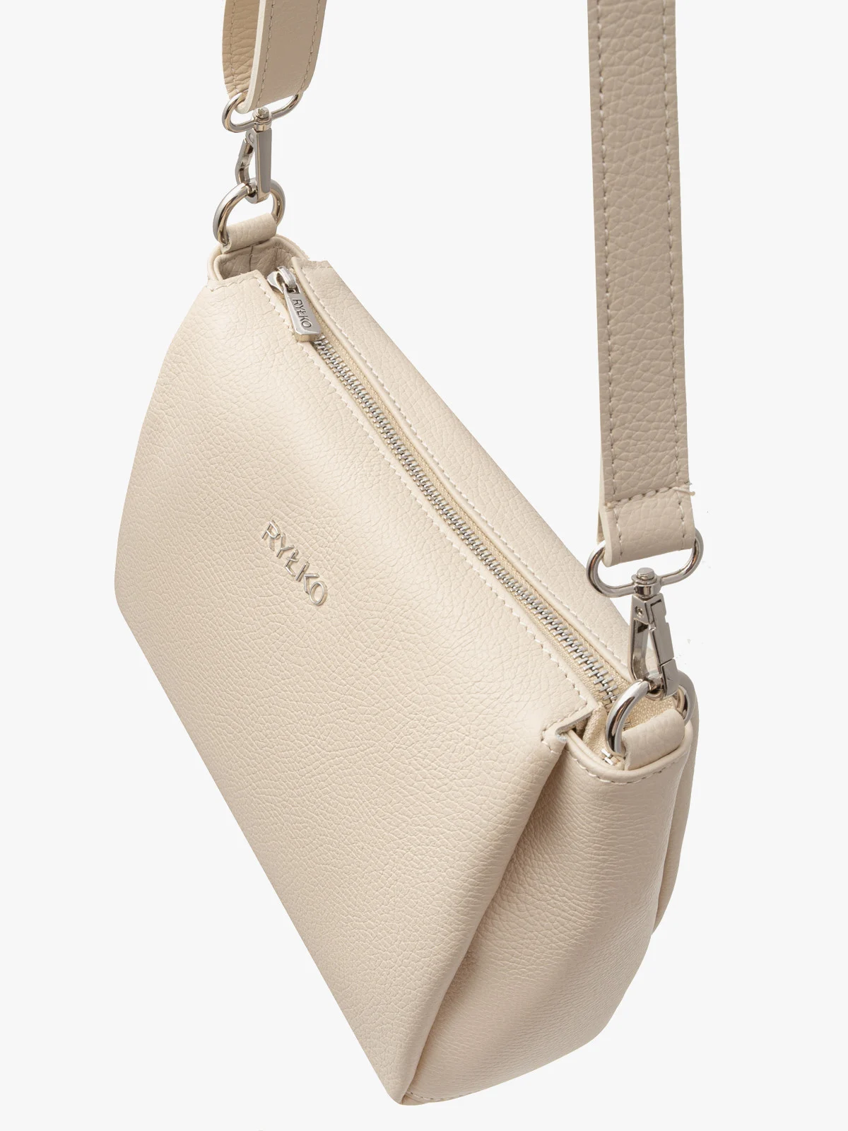 Kremowa torebka z regulowanym paskiem