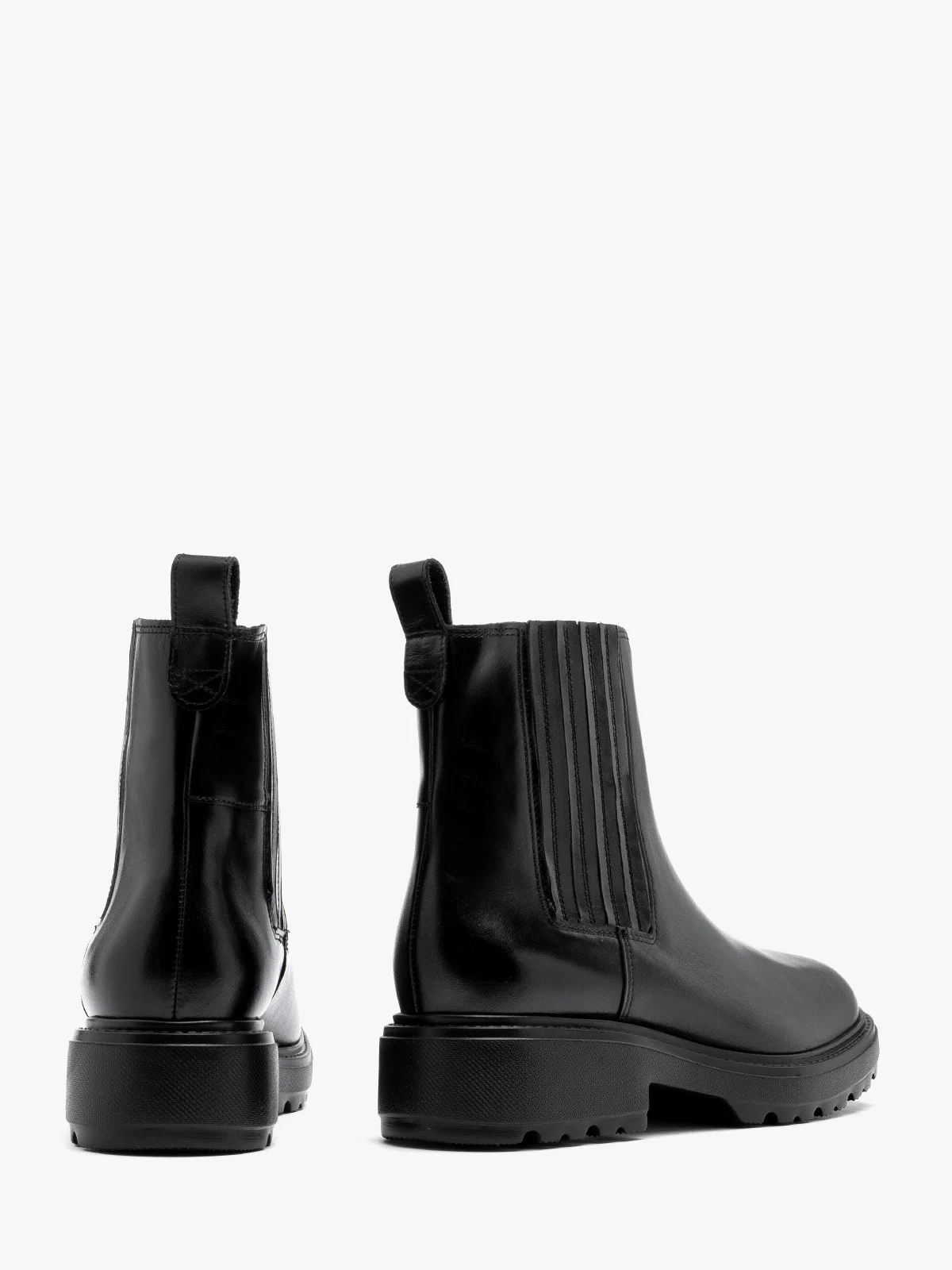 Czarne, ocieplane sztyblety z naszyciami na gumie