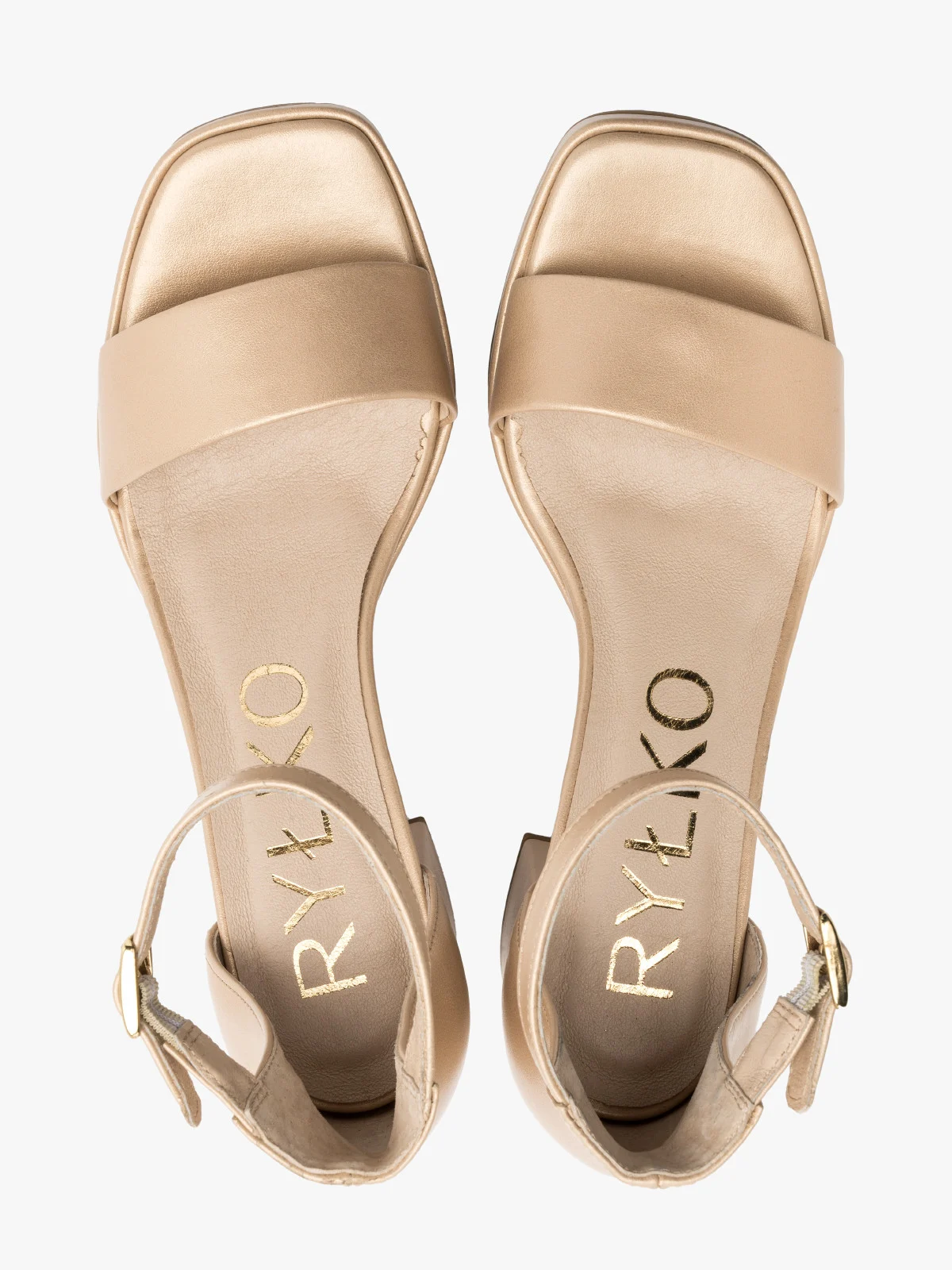 Złote sandały na masywnym obcasie i balu