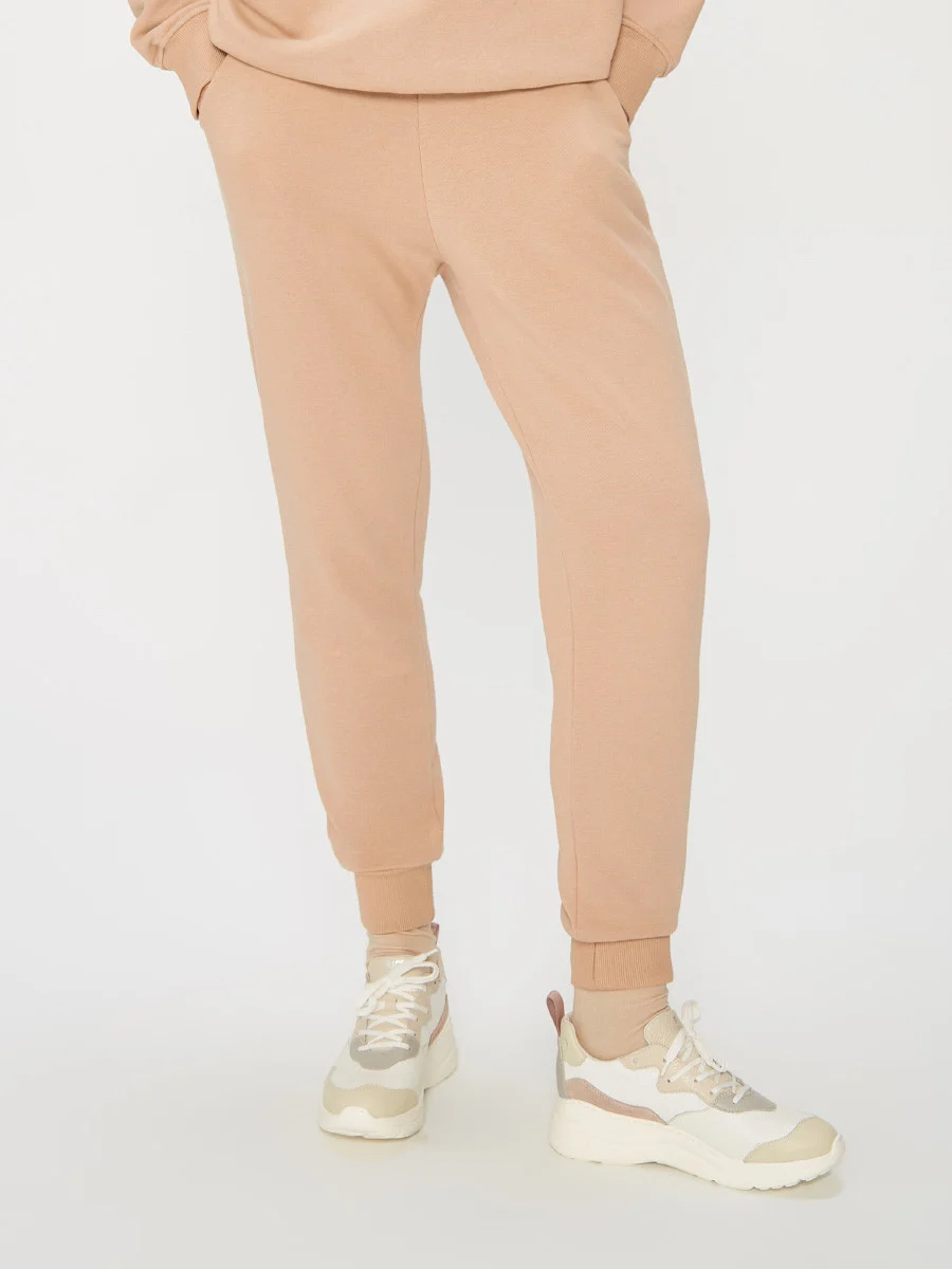 Beżowe spodnie dresowe