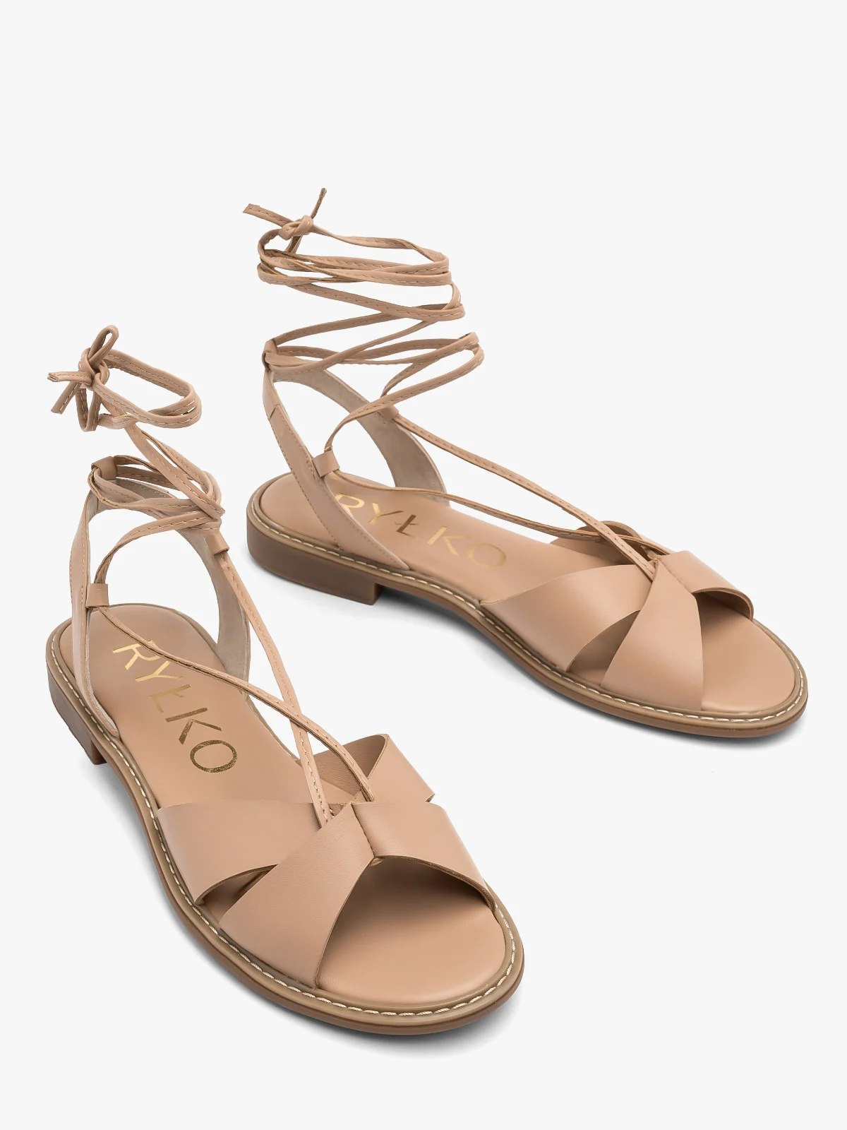 Beżowe sandały z ozdobnym sznurowaniem