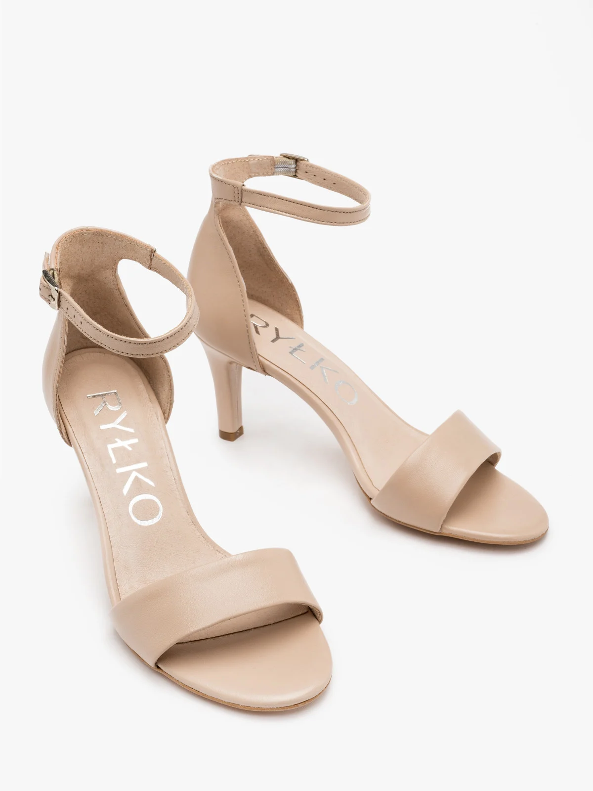 Sandały w kolorze beżowym na szpilce