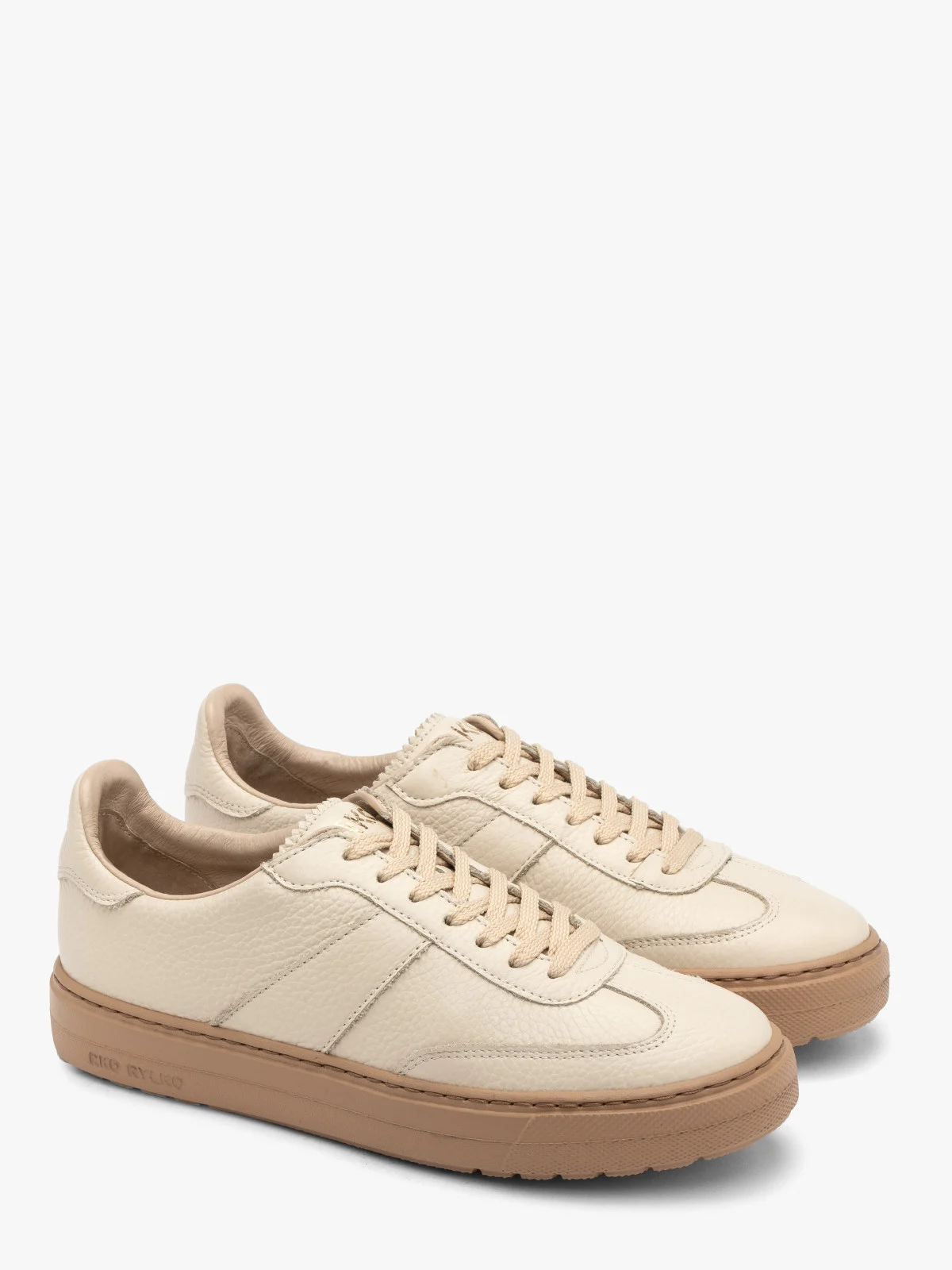 Kremowe półbuty sportowe na ciemnobeżowym spodzie