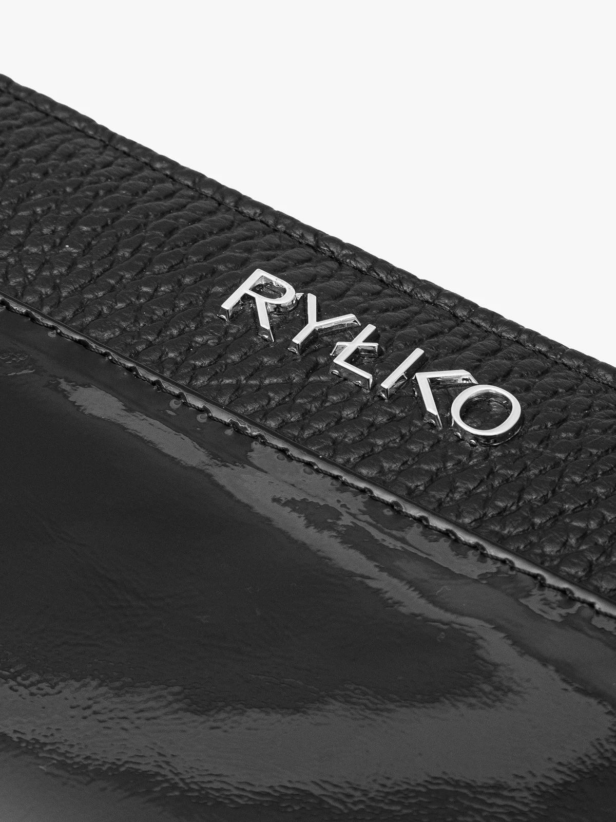 Czarny portfel damski z łączonych skór