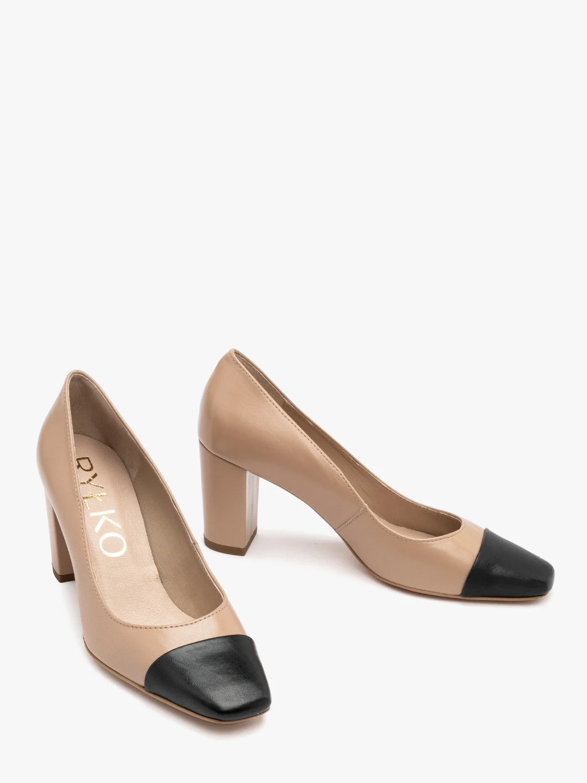 Beżowe czółenka z czarnym noskiem na słupkowym obcasie