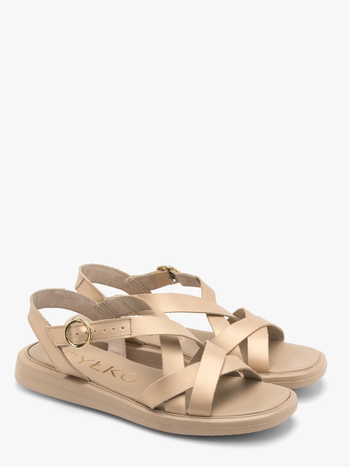 Złote sandały z ozdobnych paseczków