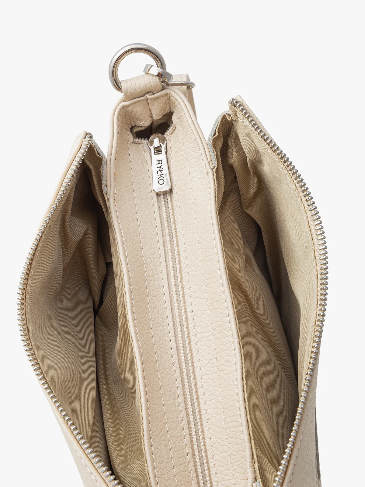 Kremowa torebka z regulowanym paskiem