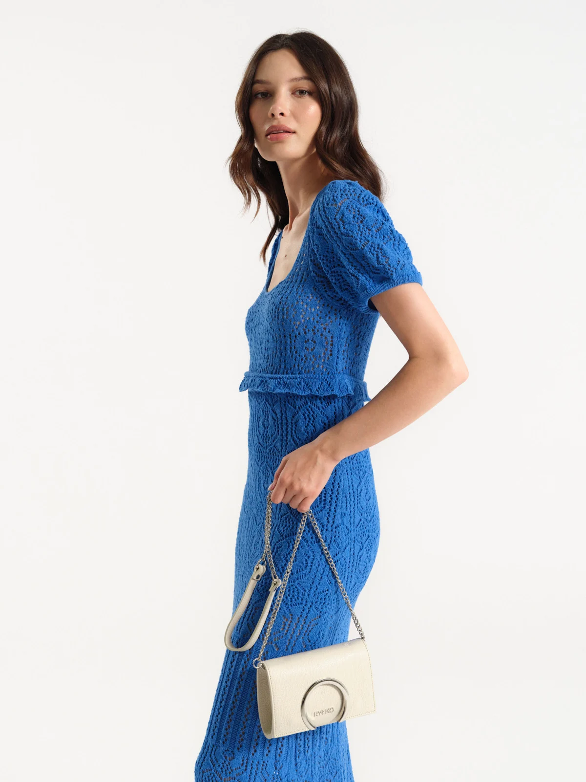 Mała, kremowa torebka typu kopertówka