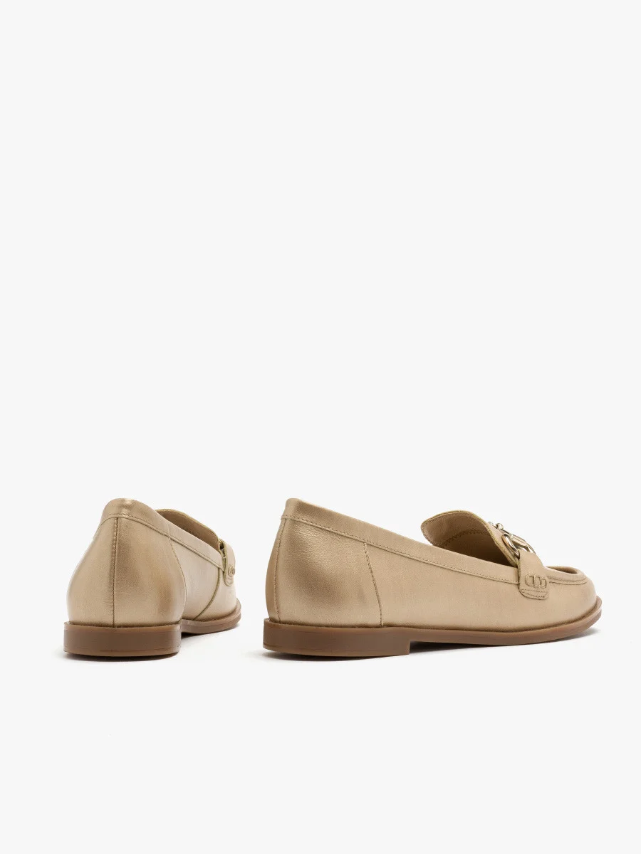 Złote mokasyny damskie