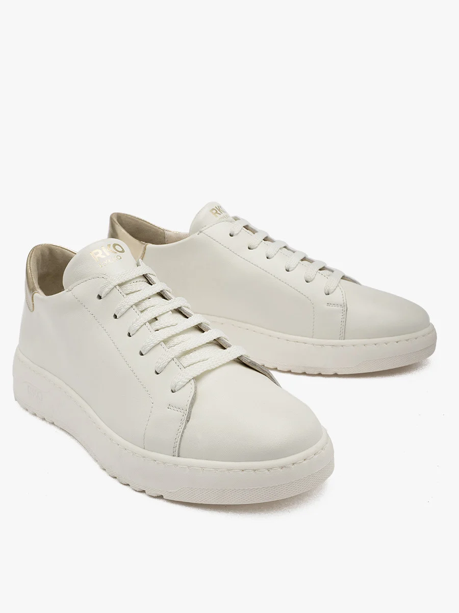 Kremowe półbuty sportowe ze złotą wstawką