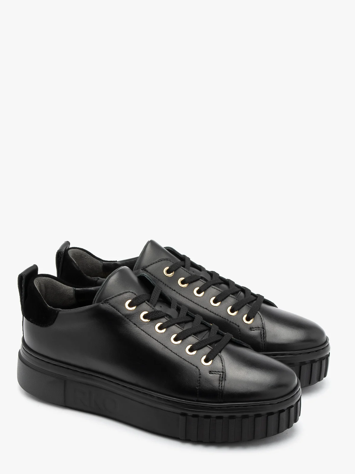 Czarne półbuty sportowe ze złotymi detalami na grubej podeszwie