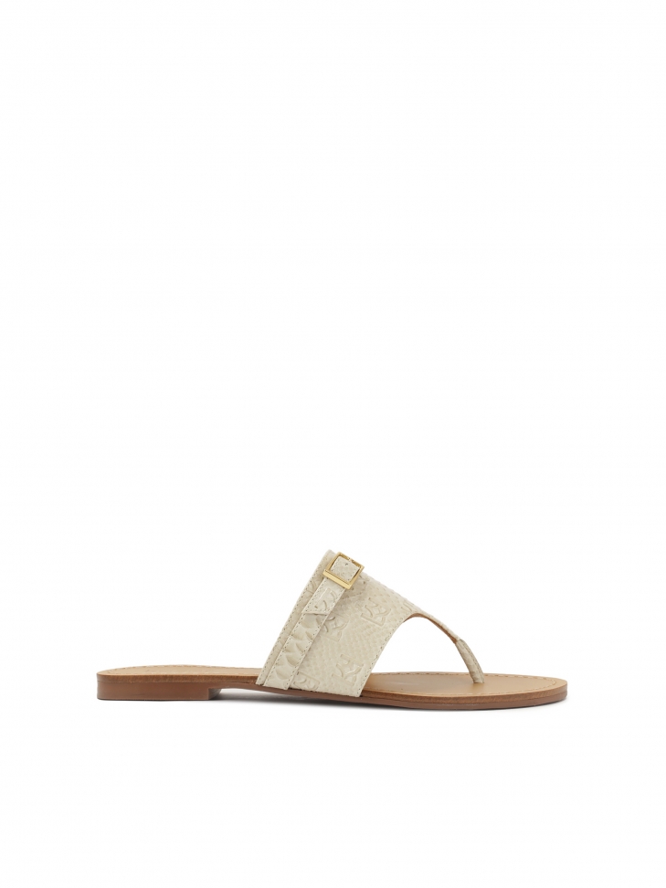 Płaskie klapki japonki z tłoczonej skóry