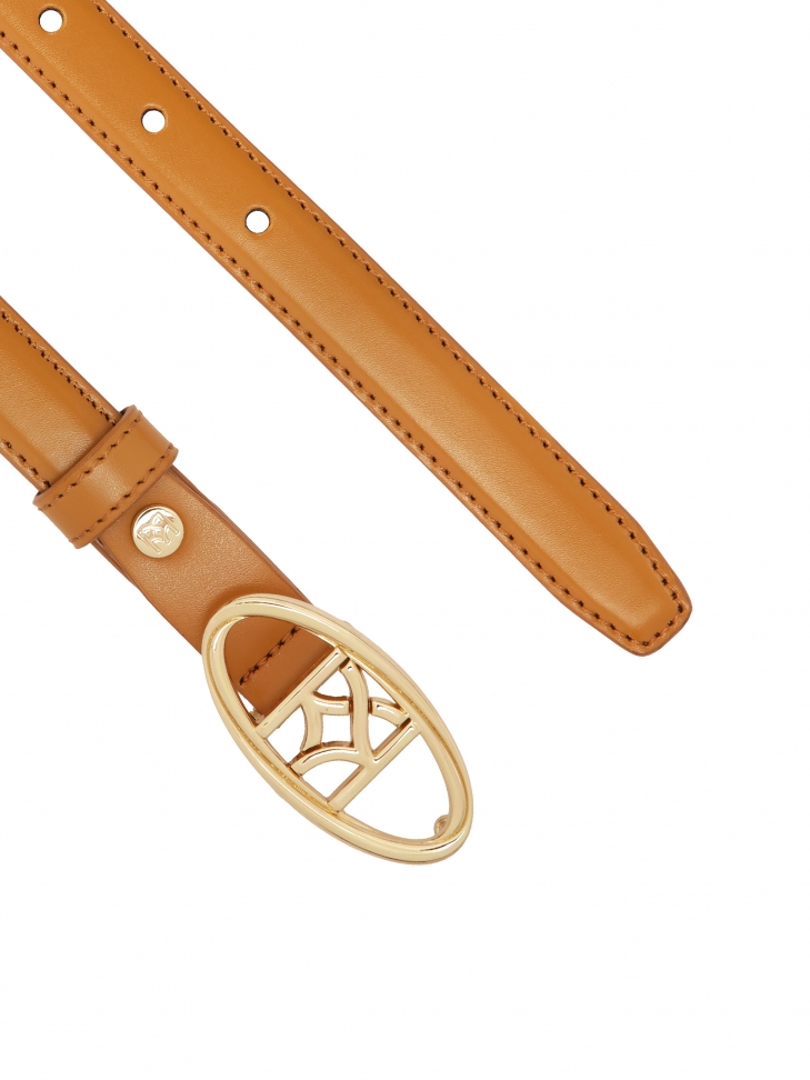 Wąski jasnobrązowy pasek z dekoracyjną klamrą