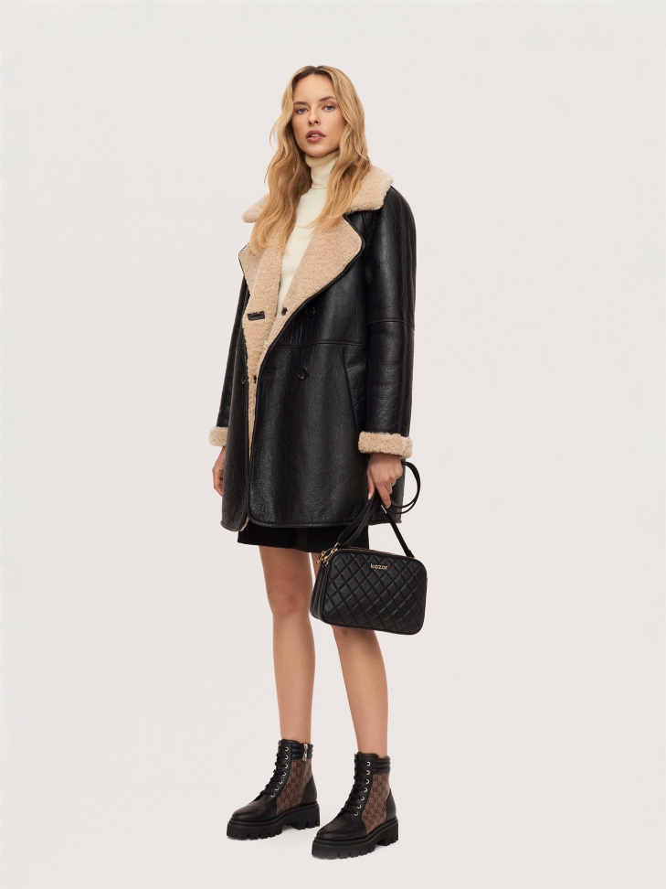 Minimalistyczna pikowana torebka z licowej skóry