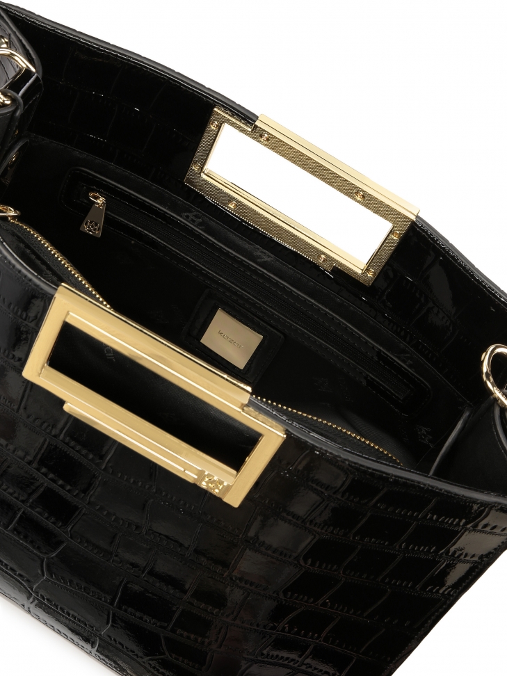 Czarna skórzana torebka z wbudowaną rączką