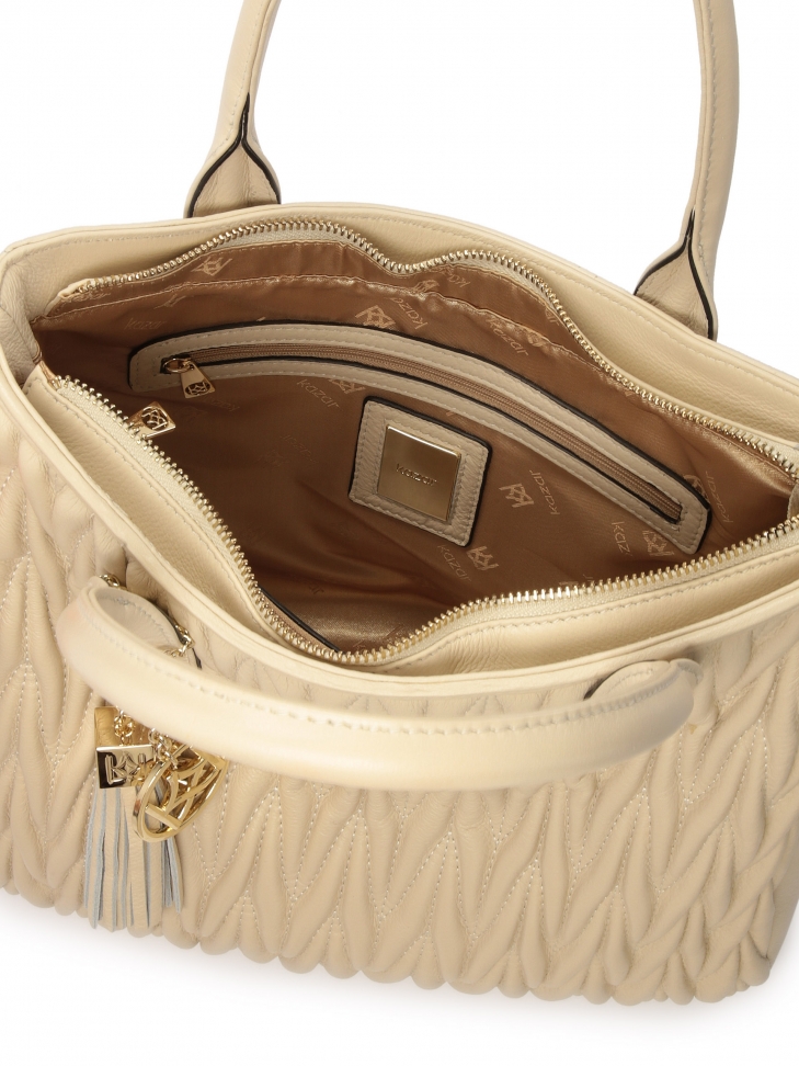 Pojemna torebka z efektownie zdobionej skóry