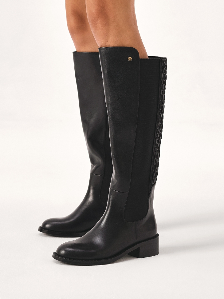 Skórzane kozaki z marszczoną wsuwaną cholewką