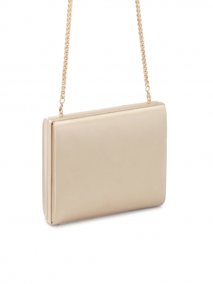 Sztywna torebka poyta beżową tkaniną