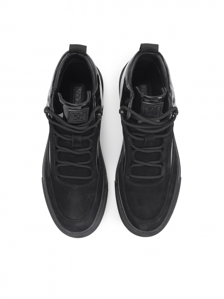 Czarne skórzane sneakersy z połyskującymi elementami